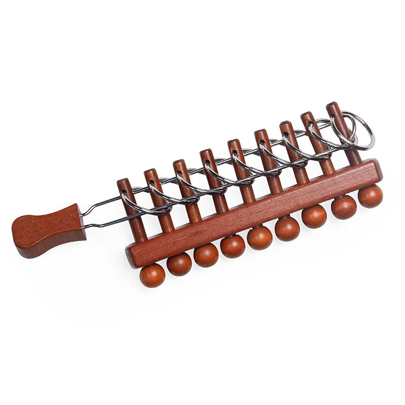 Educational toy for children to solve loops, unfasten buttons, and unlock interlocking closures