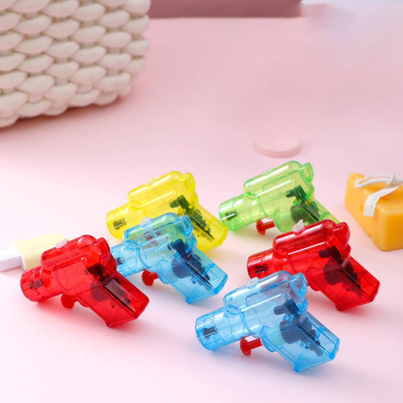 Summer water play toys, mini water guns, children's toys, transparent.